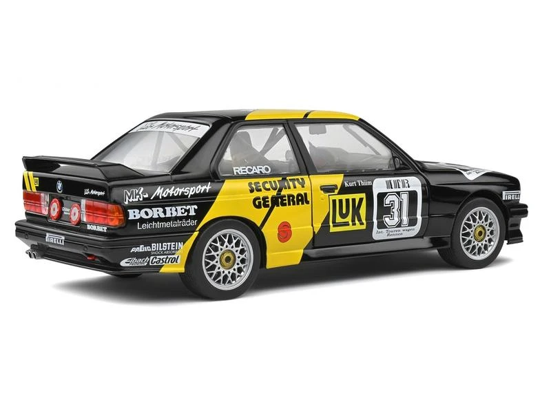 Solido Rennwagen BMW E30 M3 schwarz #31 1:18 4 Solido Rennwagen BMW E30 M3 schwarz #31 1:18 – Bild 2